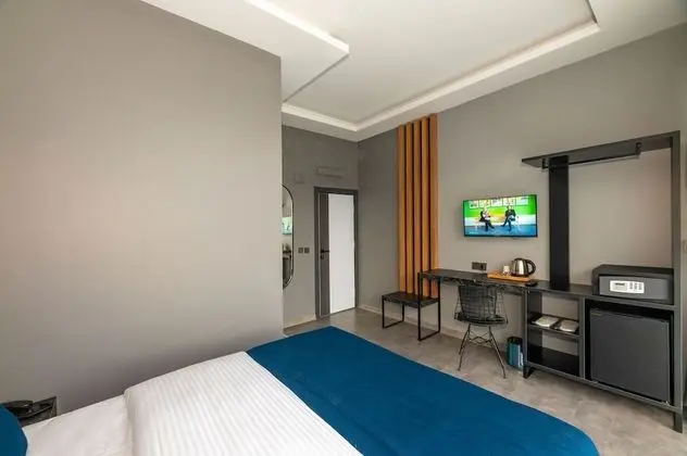 Deluxe Tek Büyük veya İki Ayrı Yataklı Oda