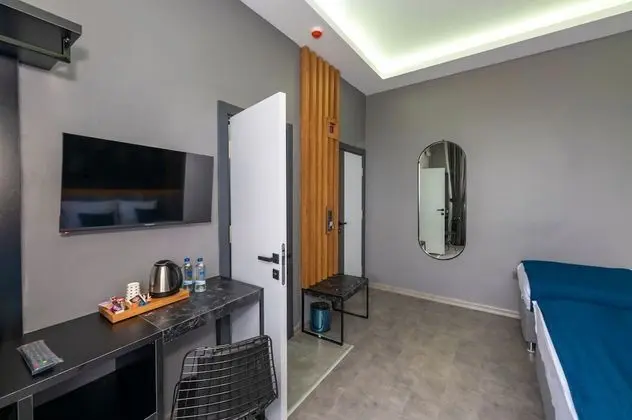 Deluxe Tek Büyük veya İki Ayrı Yataklı Oda, Balkon