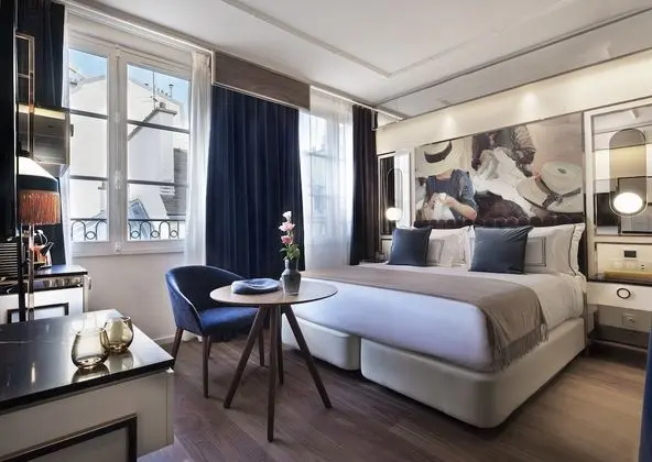 Singular Room with Glimpses of Notre Dame