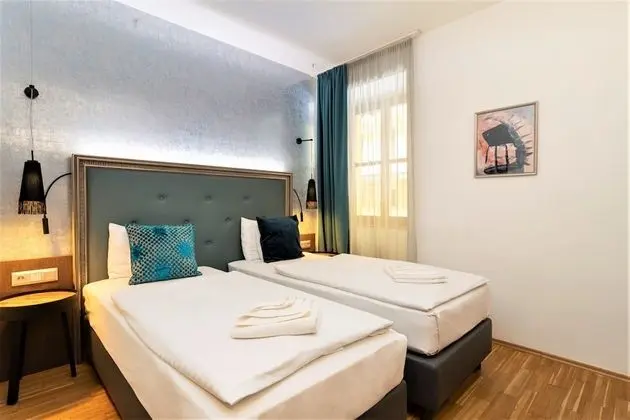 Deluxe Tek Büyük veya İki Ayrı Yataklı Oda
