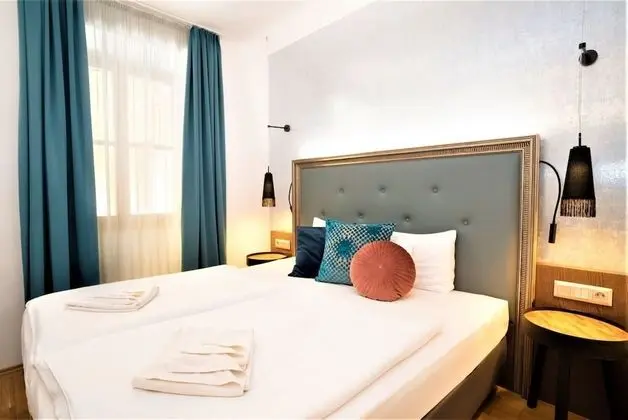 Deluxe Tek Büyük veya İki Ayrı Yataklı Oda