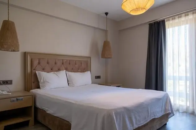 https://images.odamax.com/img/1024x768/odamax/image/upload/Mercans_Bodrum_Beach_Hotel_202605092301260__DSF0001.jpg