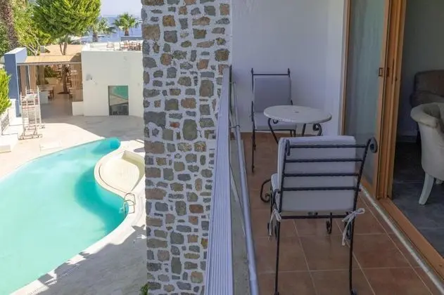 https://images.odamax.com/img/1024x768/odamax/image/upload/Mercans_Bodrum_Beach_Hotel_202605092301272__DSF0017.jpg