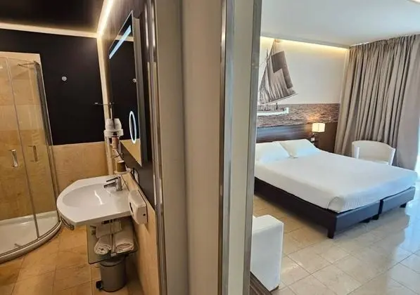 Superior Room with double bed and beautiful side sea view terrace, max 4 guests