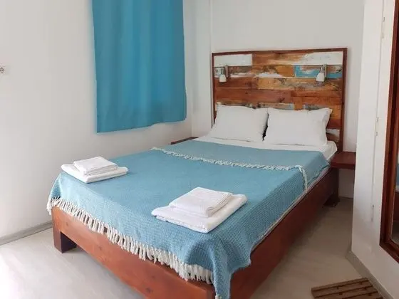 DELUXE ÇİFT KİŞİLİK TEK YATAKLI VERANDALI ODA