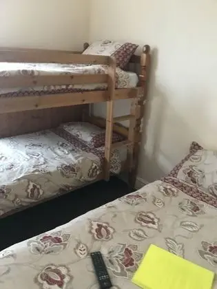 Üç Kişilik Oda