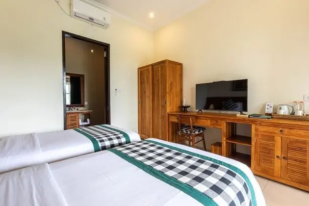 Deluxe Tek Büyük veya İki Ayrı Yataklı Oda