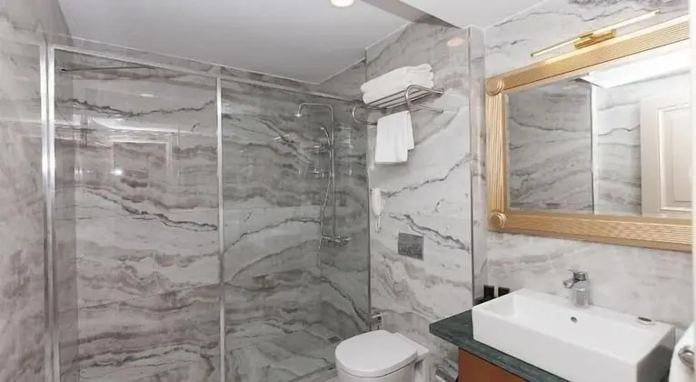 Deluxe Quadruple Room with Balcony