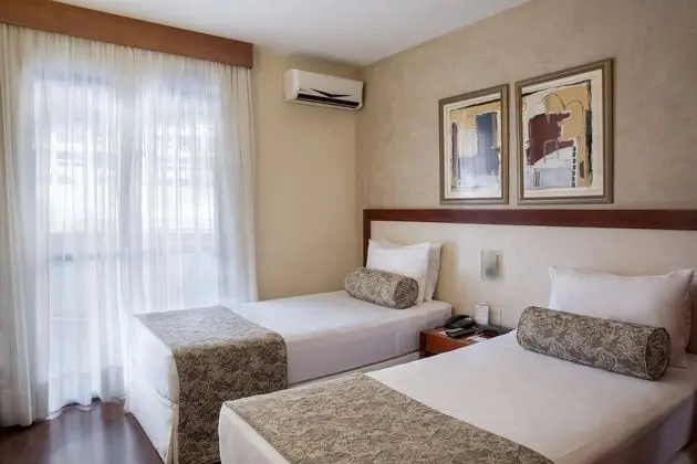 Suíte Superior (2 camas solteiro e 1 sofá-cama solteiro)