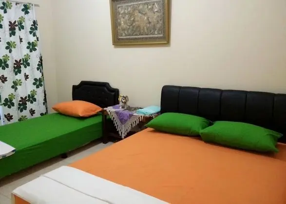 Standard Üç Kişilik Oda, Bahçe Manzaralı