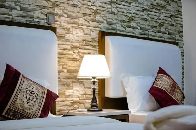 Deluxe Tek Büyük veya İki Ayrı Yataklı Oda