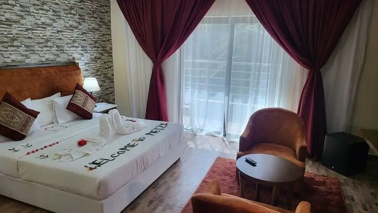 Deluxe Tek Büyük veya İki Ayrı Yataklı Oda