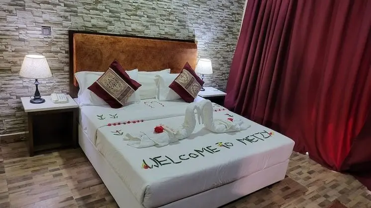 Deluxe Tek Büyük veya İki Ayrı Yataklı Oda