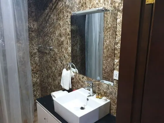 Deluxe Tek Büyük veya İki Ayrı Yataklı Oda