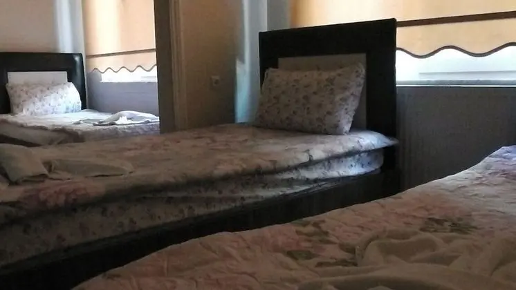 Üç Kişilik Oda