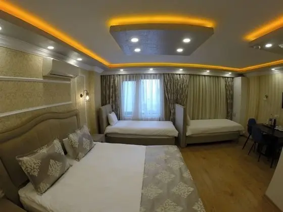 Deluxe Dört Kişilik Oda