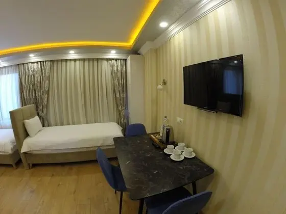 Deluxe Dört Kişilik Oda