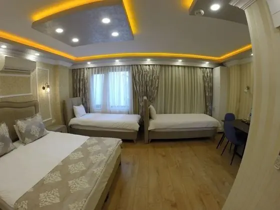 Deluxe Dört Kişilik Oda