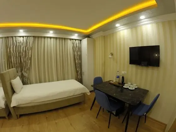 Deluxe Dört Kişilik Oda