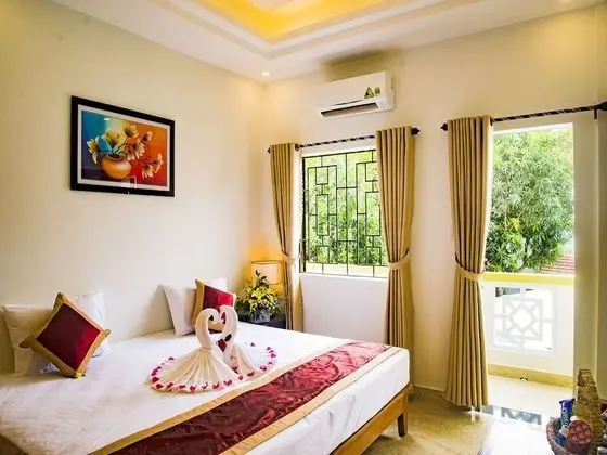 Deluxe Tek Büyük veya İki Ayrı Yataklı Oda, Balkon, Bahçe Manzaralı