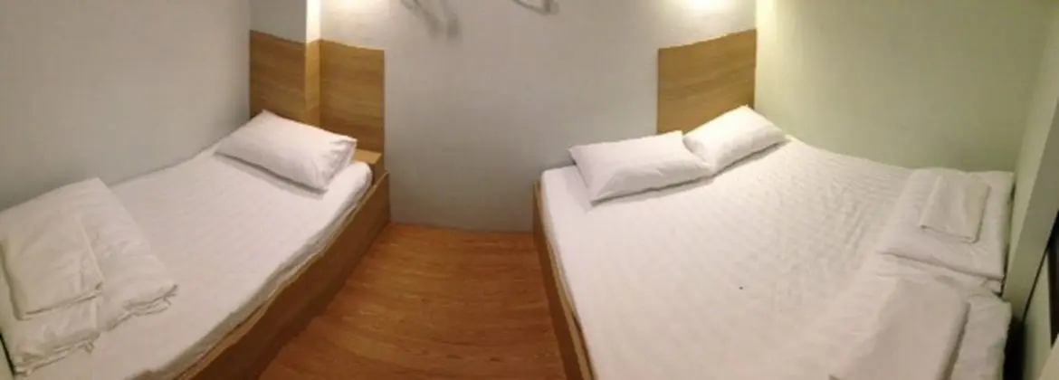 Triple Bed with Shared Bathroom