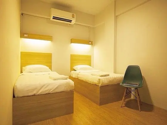 Twin Bed with Shared Bathroom