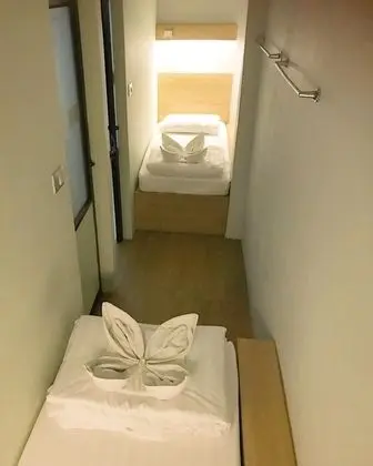 Twin Bed with Shared Bathroom