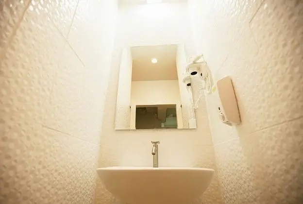 Twin Bed with Shared Bathroom