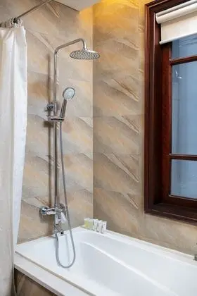 Deluxe Tek Büyük veya İki Ayrı Yataklı Oda