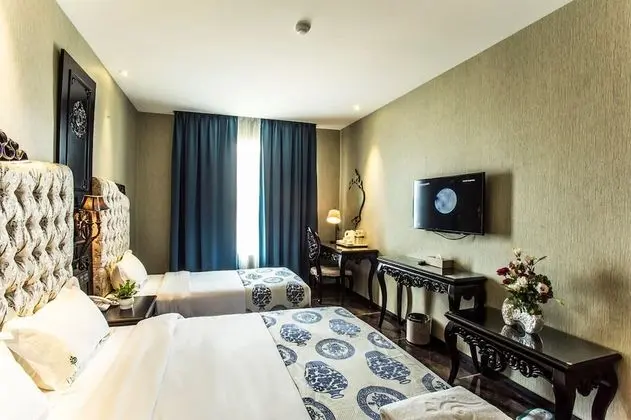 Deluxe Üç Kişilik Oda