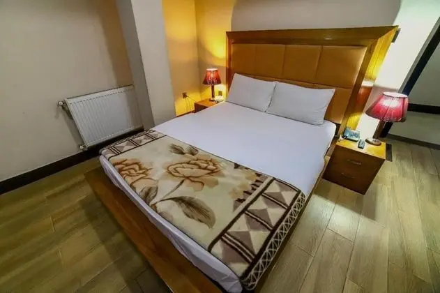 Deluxe Tek Büyük veya İki Ayrı Yataklı Oda