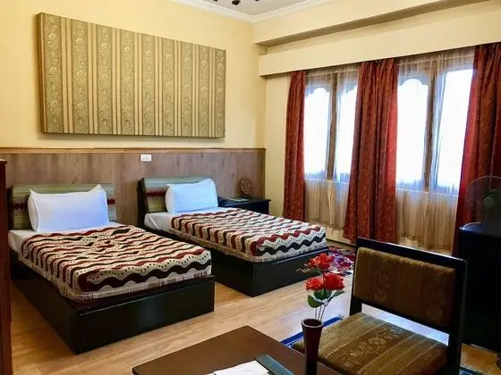 Deluxe Tek Büyük veya İki Ayrı Yataklı Oda