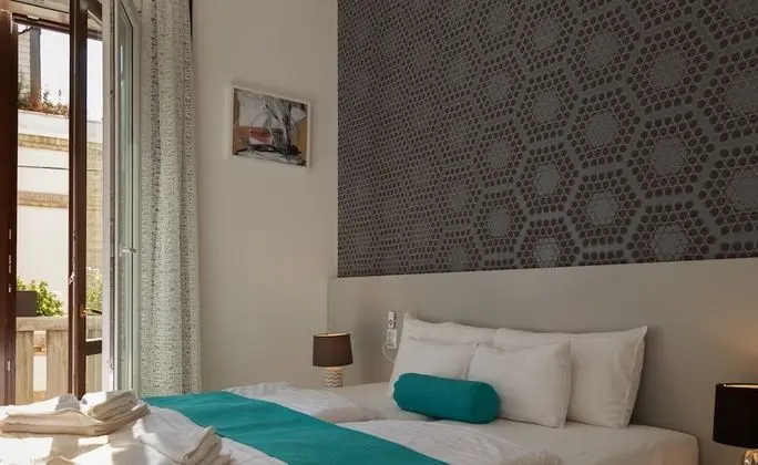 Deluxe Tek Büyük veya İki Ayrı Yataklı Oda, Balkon