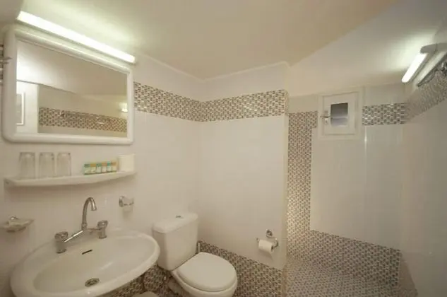 Economy Üç Kişilik Oda