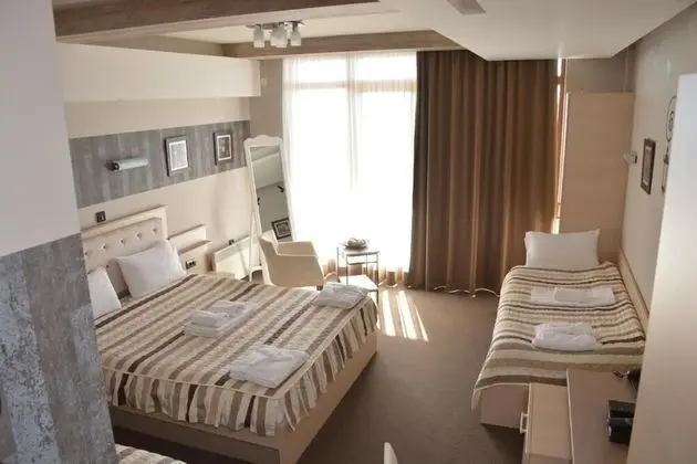 Deluxe Dört Kişilik Oda