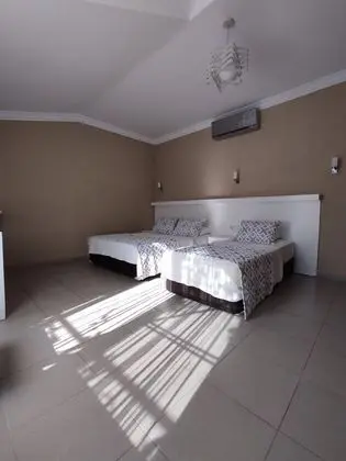 Üç Kişilik Oda