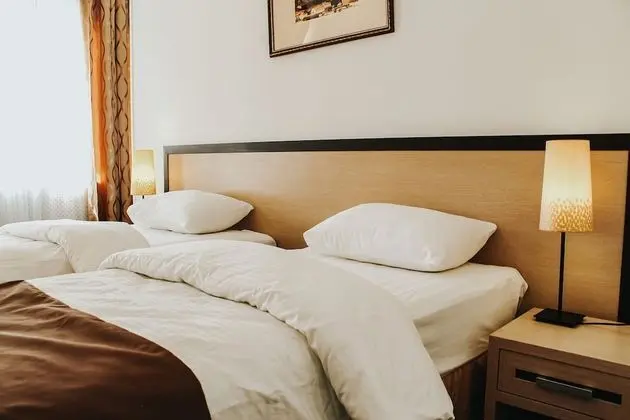 Comfort Tek Büyük veya İki Ayrı Yataklı Oda