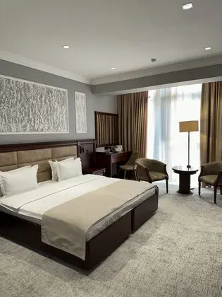 Deluxe Tek Büyük veya İki Ayrı Yataklı Oda