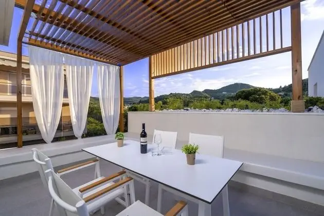 Deluxe Maisonette with Balcony Pool View