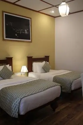 Deluxe Tek Büyük veya İki Ayrı Yataklı Oda