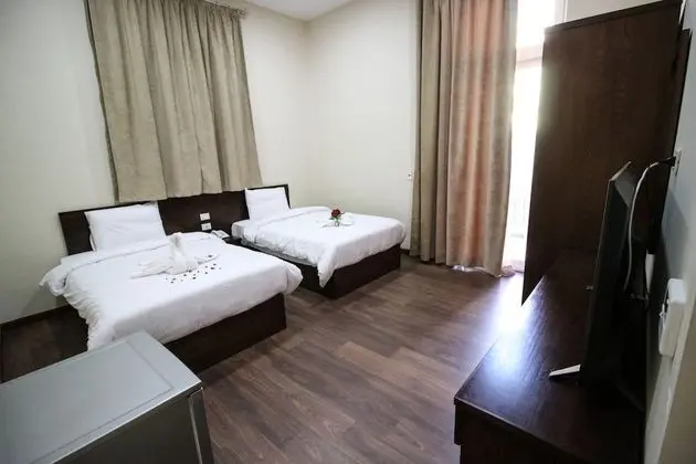 Deluxe Tek Büyük veya İki Ayrı Yataklı Oda