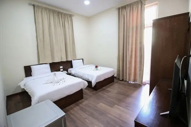 Deluxe Tek Büyük veya İki Ayrı Yataklı Oda