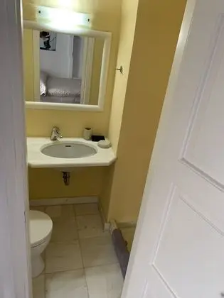 Üç Kişilik Oda, Bahçe Manzaralı
