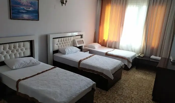 Üç Kişilik Oda