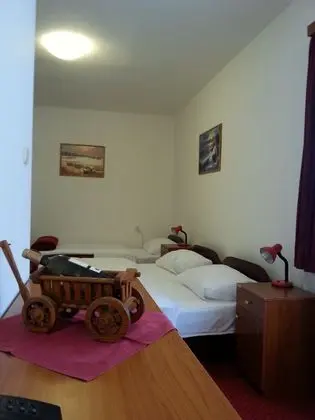 Üç Kişilik Oda