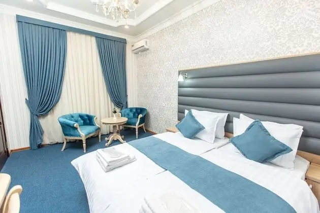 Deluxe Tek Büyük veya İki Ayrı Yataklı Oda