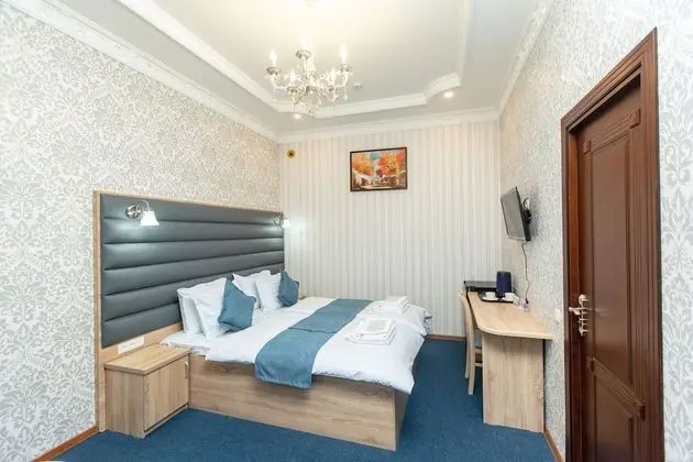 Deluxe Tek Büyük veya İki Ayrı Yataklı Oda