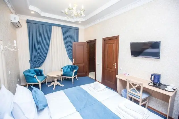 Deluxe Tek Büyük veya İki Ayrı Yataklı Oda