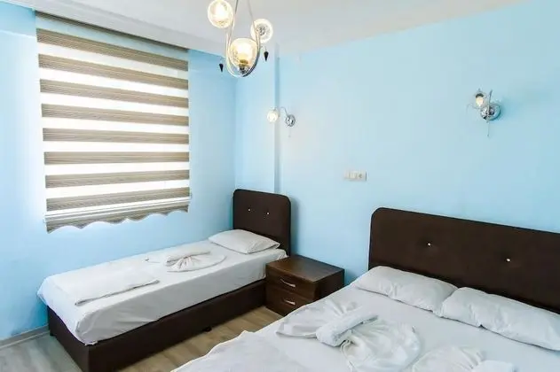Üç Kişilik Oda