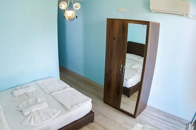 Üç Kişilik Oda